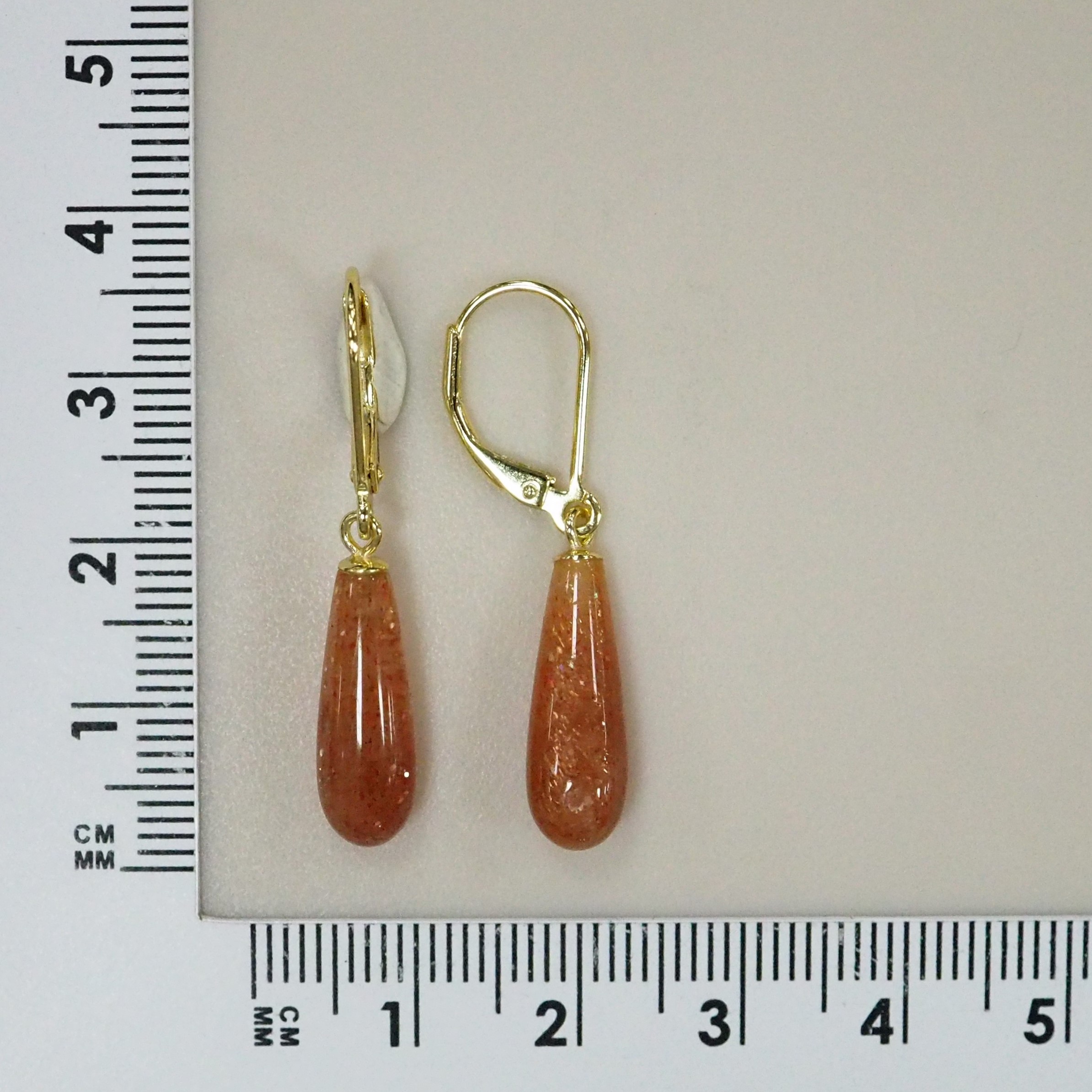 Серебряные серьги с солнечными камнями